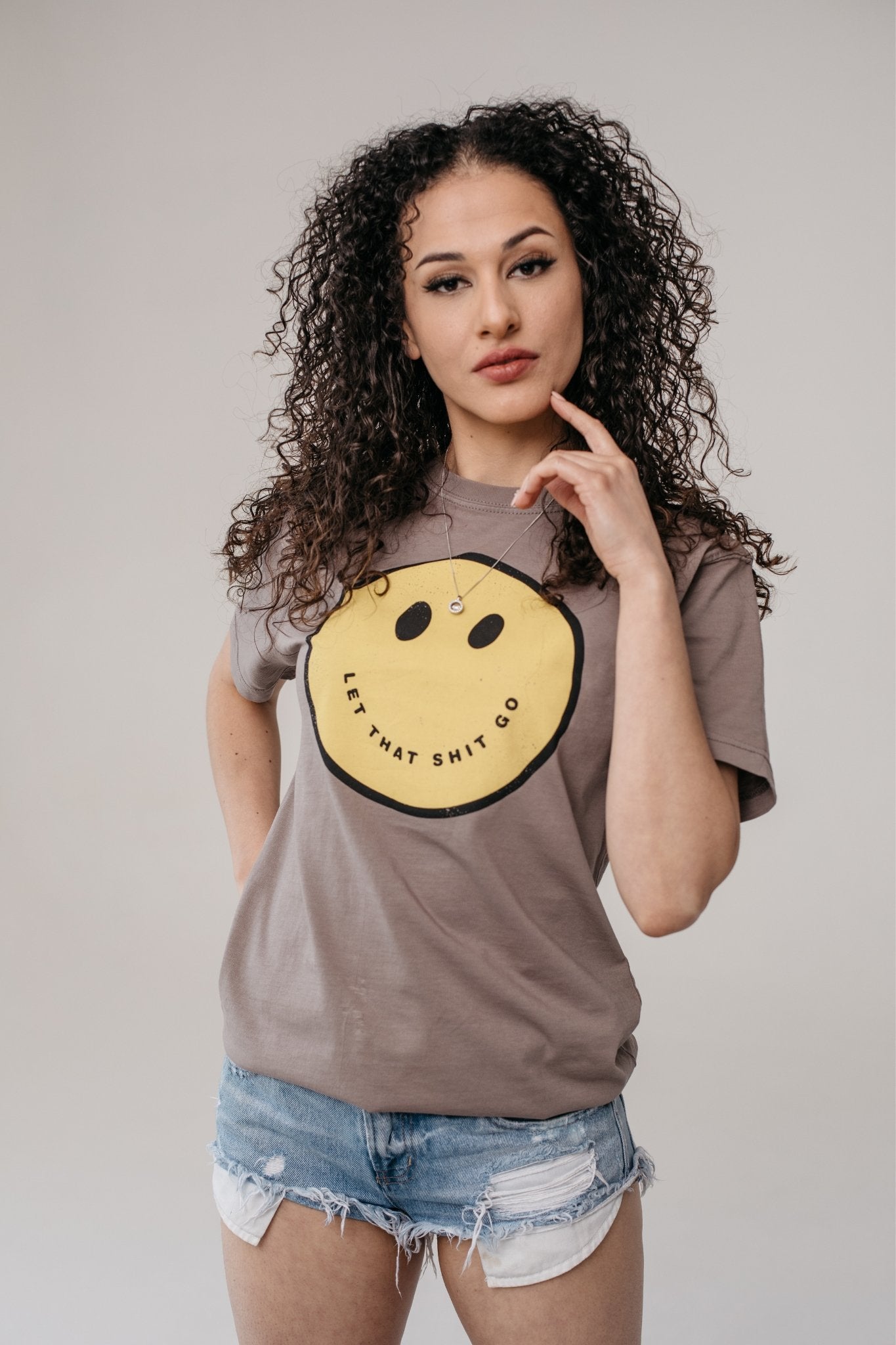 Let That Sh*t Go Smile Tee -